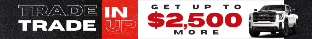 Trade-in offer ad promoting up to $2,500 bonus, featuring a white GMC truck.