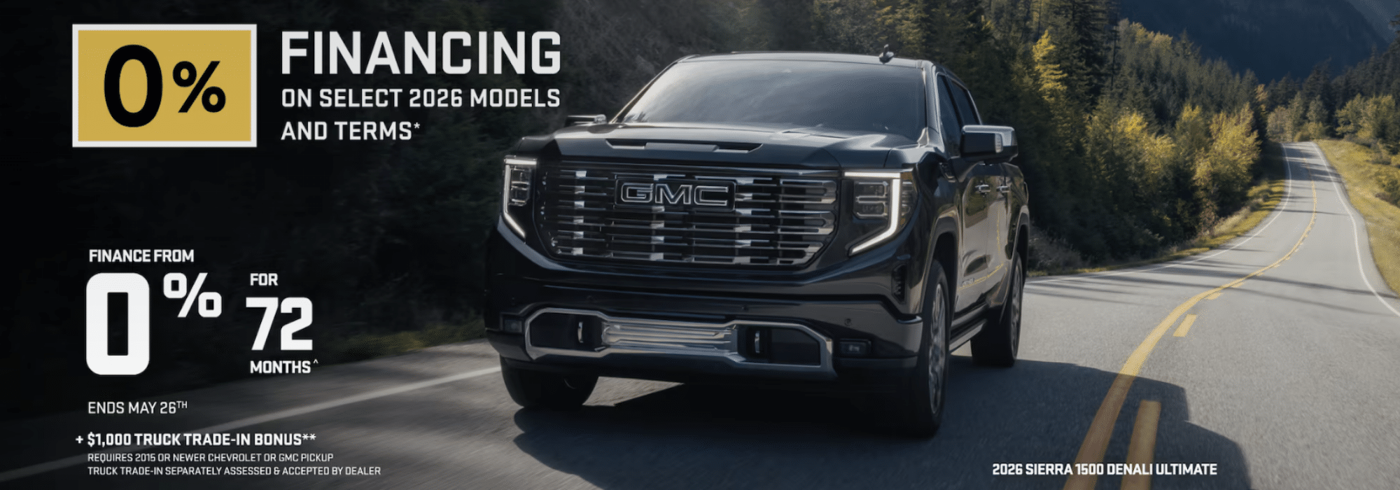2026 GMC Sierra 1500 Denali on highway with 0% financing offer for 72 months, ending May 26th.