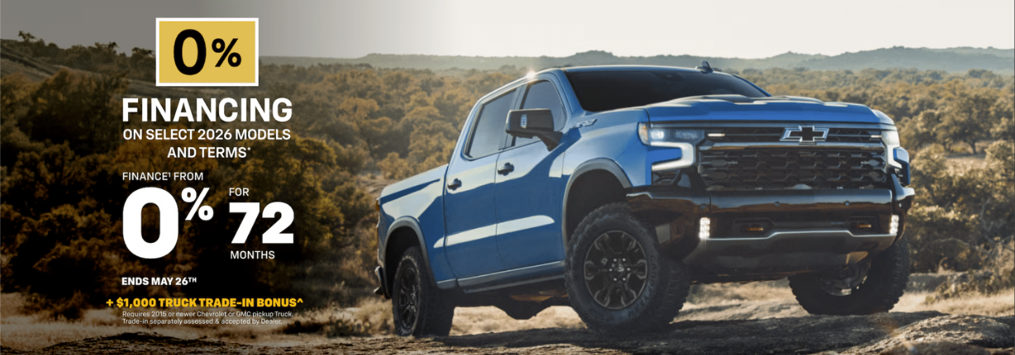 Blue truck in a scenic landscape, promoting 0% financing on 2026 models for 72 months, offer ends May 26th.